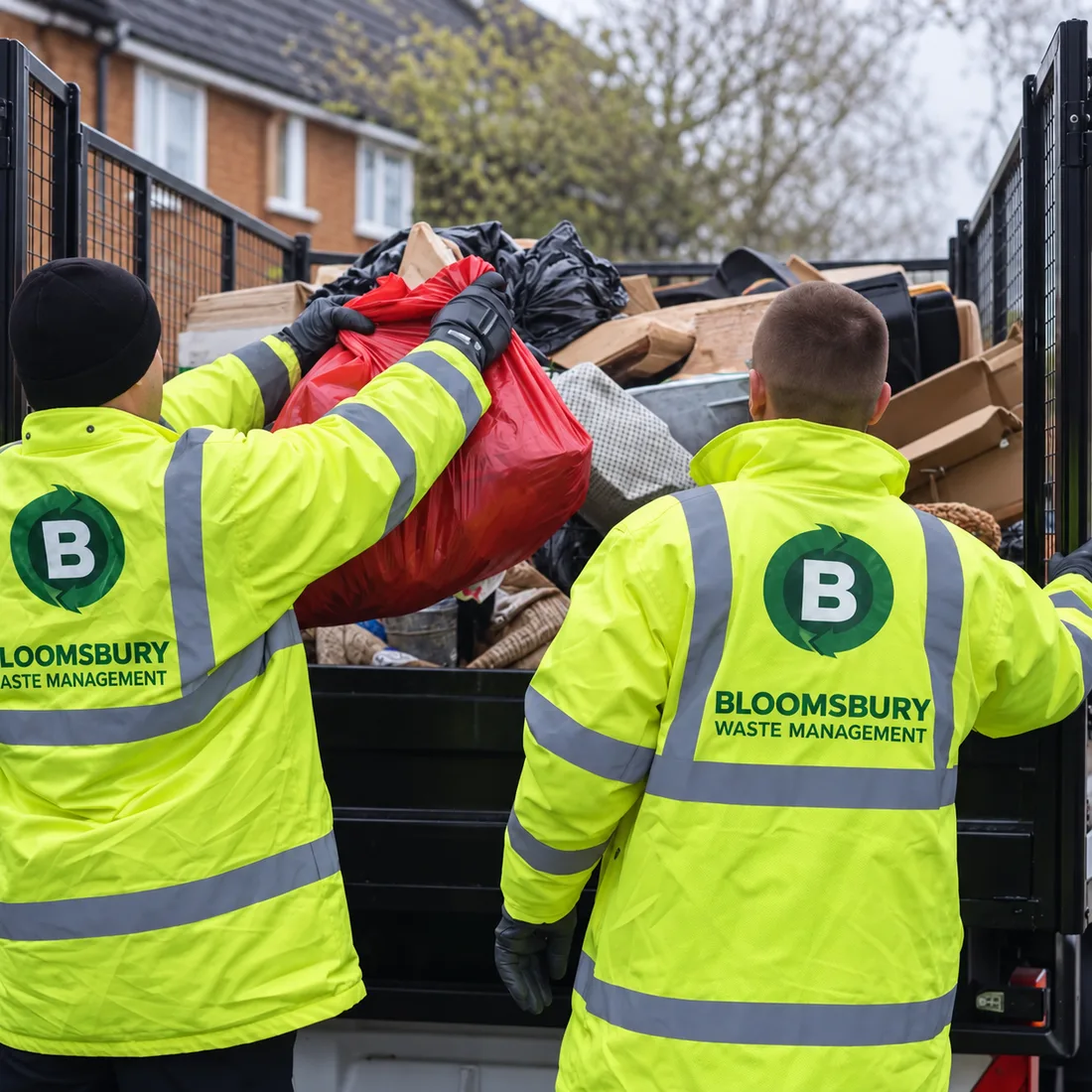 Bloomsbury branded waste removal team loading a collection vehicle